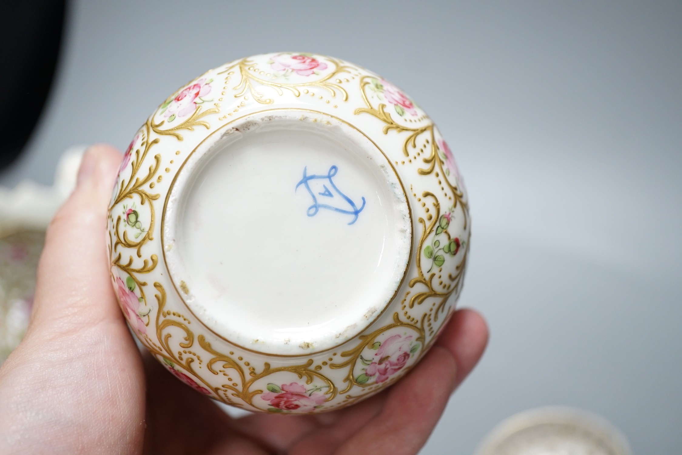 A Vienna porcelain small spittoon, early 19th century, a Sevres style jug, sucrier and pot and a Rudolstadt dish